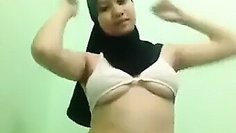 Indonesian Babe Strips Down And Masturbates On Camera